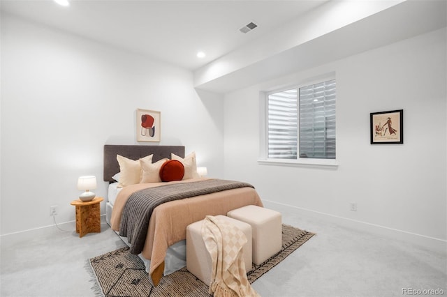 carpeted bedroom with baseboards and recessed lighting