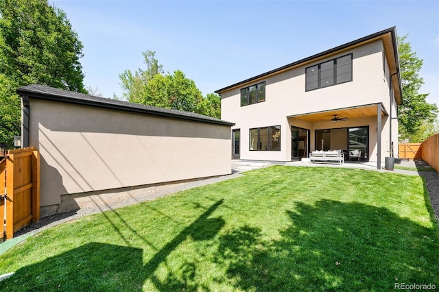 back of property featuring stucco siding, a patio, and ceiling fan