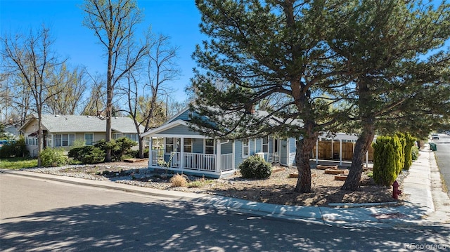 4196 S Pennsylvania St, Englewood, CO 80113 - view of front of house featuring covered porch