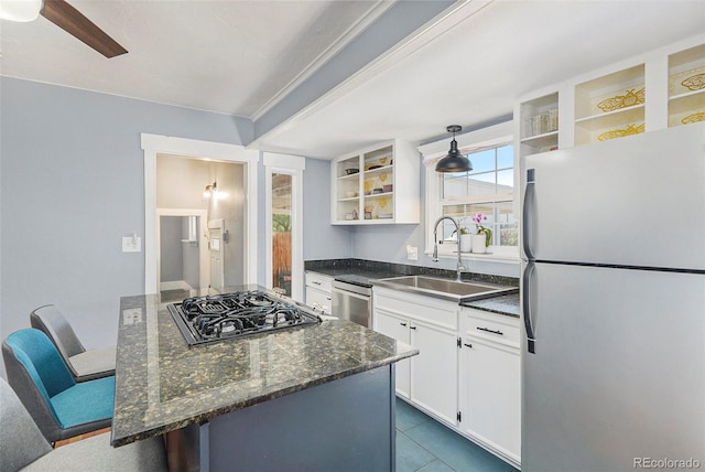 4196 S Pennsylvania St, Englewood, CO 80113 - kitchen with open shelves, a sink, stainless steel appliances, white cabinetry, and a kitchen bar