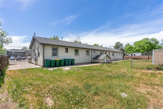 10911 W 44th Pl, Wheat Ridge, CO 80033 - back of house with a patio area