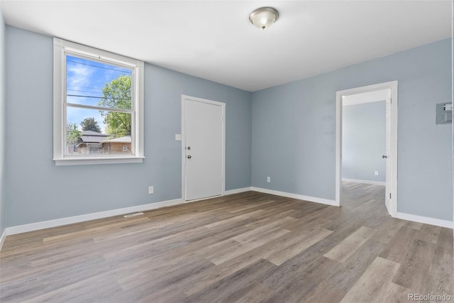 10911 W 44th Pl, Wheat Ridge, CO 80033 - unfurnished room with wood finished floors and baseboards