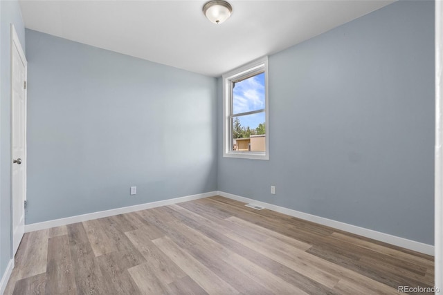 10911 W 44th Pl, Wheat Ridge, CO 80033 - empty room with light wood-type flooring and baseboards