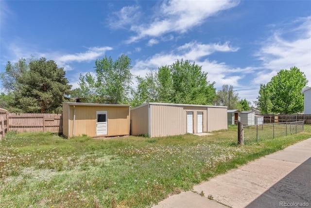 10911 W 44th Pl, Wheat Ridge, CO 80033 - view of yard with an outdoor structure and a shed