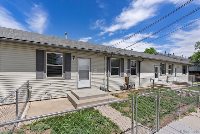 10911 W 44th Pl, Wheat Ridge, CO 80033 - view of front of house with a fenced front yard and a gate