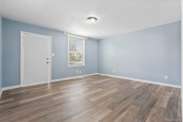 10911 W 44th Pl, Wheat Ridge, CO 80033 - unfurnished room with wood finished floors and baseboards