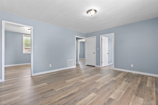 10911 W 44th Pl, Wheat Ridge, CO 80033 - spare room with wood finished floors and baseboards