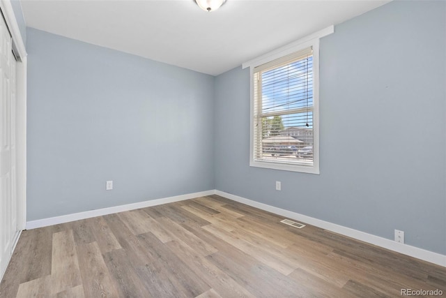 10911 W 44th Pl, Wheat Ridge, CO 80033 - empty room with wood finished floors and baseboards
