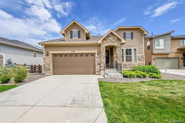 6335 E 143rd Dr, Thornton, CO 80602 - view of front of property with stone siding, concrete driveway, a garage, a front yard, and roof with shingles
