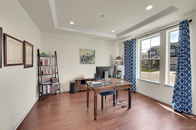 6335 E 143rd Dr, Thornton, CO 80602 - office featuring a tray ceiling, dark wood-type flooring, recessed lighting, and ornamental molding
