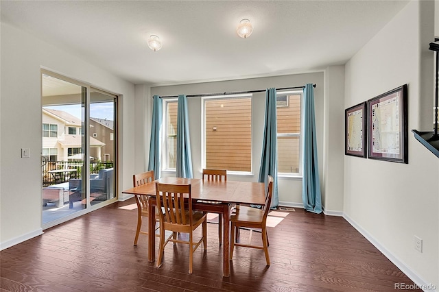 6335 E 143rd Dr, Thornton, CO 80602 - dining room featuring dark wood-type flooring