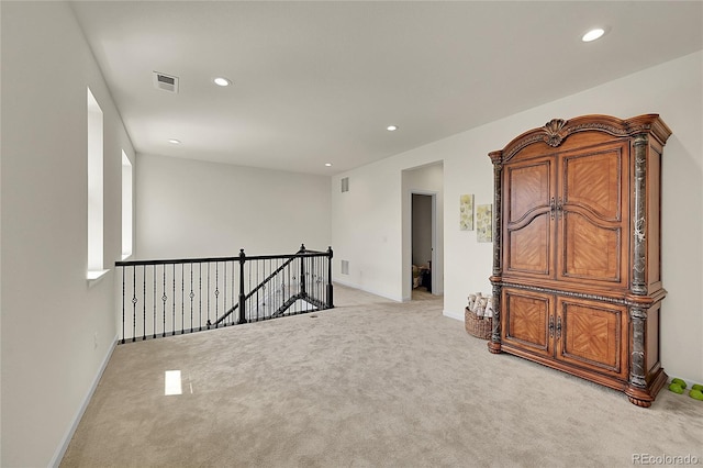 6335 E 143rd Dr, Thornton, CO 80602 - spare room with light carpet and recessed lighting