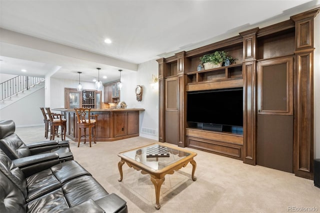 9151 E Harvard Ave, Denver, CO 80231 - living area with carpet, stairway, and recessed lighting