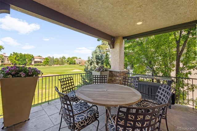 9151 E Harvard Ave, Denver, CO 80231 - view of patio / terrace with outdoor dining space and view of golf course