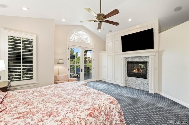 9151 E Harvard Ave, Denver, CO 80231 - bedroom with carpet flooring, access to exterior, french doors, lofted ceiling, and a glass covered fireplace