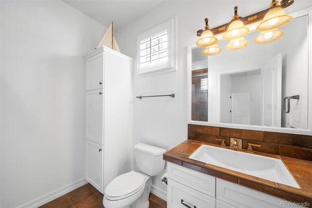 9151 E Harvard Ave, Denver, CO 80231 - bathroom with vanity and toilet