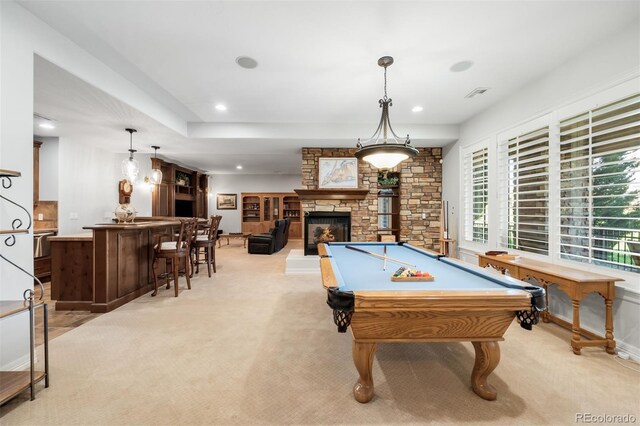 9151 E Harvard Ave, Denver, CO 80231 - recreation room featuring light colored carpet, a stone fireplace, recessed lighting, pool table, and bar area