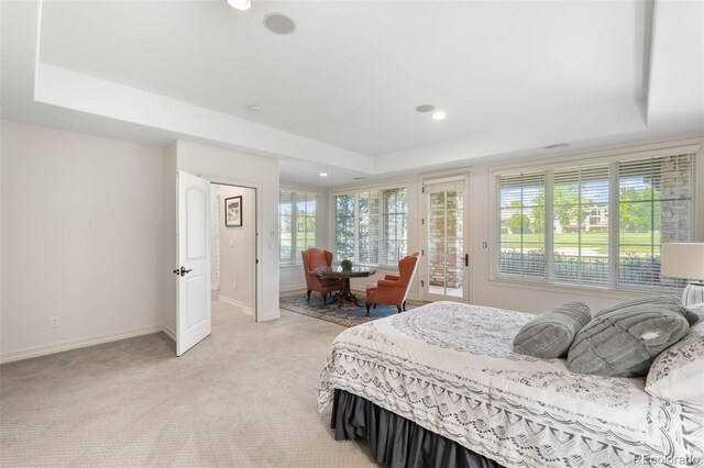 9151 E Harvard Ave, Denver, CO 80231 - bedroom featuring a raised ceiling, access to outside, light carpet, and recessed lighting