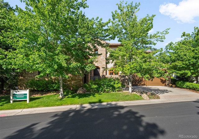 9151 E Harvard Ave, Denver, CO 80231 - view of front of home with concrete driveway