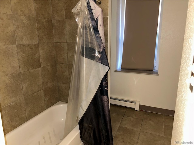 full bathroom featuring a baseboard heating unit, shower / tub combo, tile patterned flooring, and baseboards