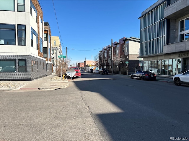 view of road featuring curbs and sidewalks