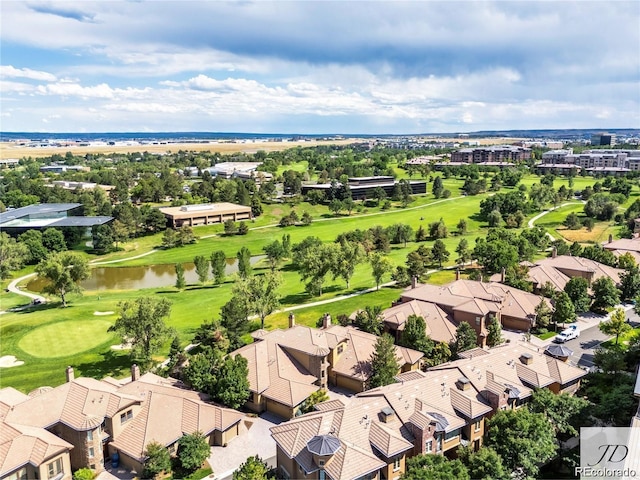 bird's eye view featuring a residential view, golf course view, and a water view