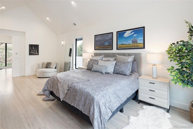 62 Jasmine St, Denver, CO 80220 - bedroom with light wood finished floors, baseboards, high vaulted ceiling, and recessed lighting