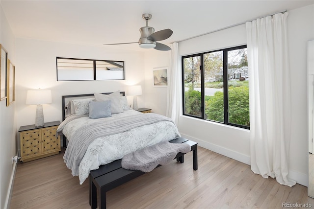 62 Jasmine St, Denver, CO 80220 - bedroom featuring baseboards, light wood-style flooring, and a ceiling fan