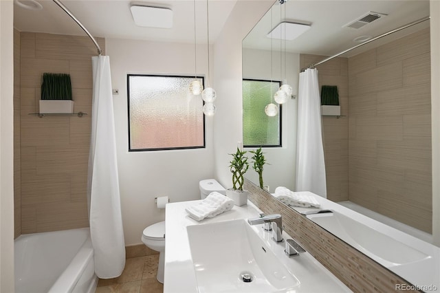 62 Jasmine St, Denver, CO 80220 - full bathroom featuring tile patterned floors, toilet, vanity, and shower / tub combo