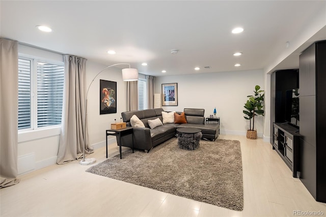 62 Jasmine St, Denver, CO 80220 - living room featuring light wood-style flooring, recessed lighting, and baseboards