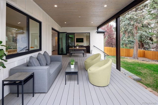 62 Jasmine St, Denver, CO 80220 - wooden deck with an outdoor hangout area