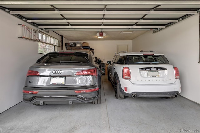 62 Jasmine St, Denver, CO 80220 - garage featuring a garage door opener