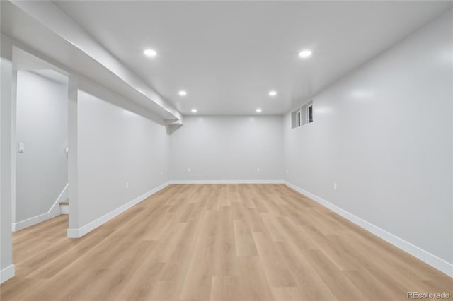 1436 S Yates St, Denver, CO 80219 - finished basement with recessed lighting, light wood-type flooring, and stairs