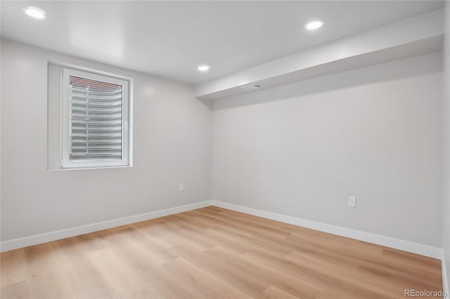 1436 S Yates St, Denver, CO 80219 - finished below grade area featuring light wood-style flooring and recessed lighting