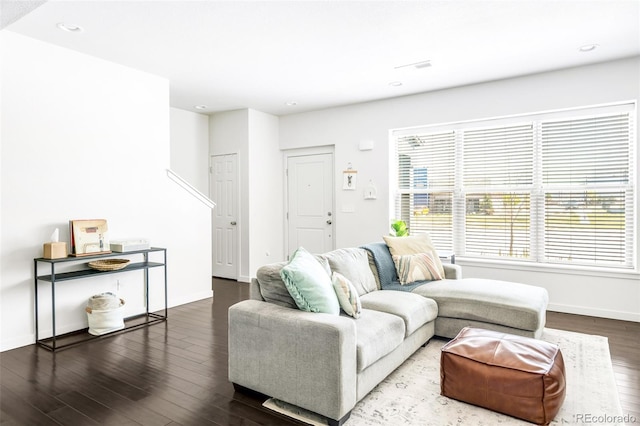 5025 Central Park Blvd, Denver, CO 80238 - living room with wood finished floors, baseboards, and recessed lighting
