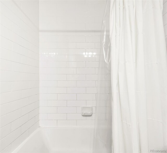 5025 Central Park Blvd, Denver, CO 80238 - bathroom with shower / bath combination with curtain