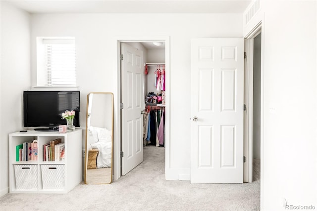5025 Central Park Blvd, Denver, CO 80238 - carpeted bedroom with a walk in closet and a closet