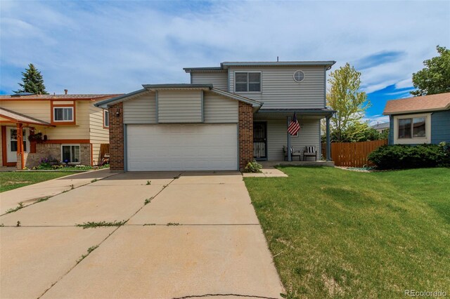 6119 Zenobia Ct, Arvada, CO 80003 - view of front of house featuring an attached garage and concrete driveway
