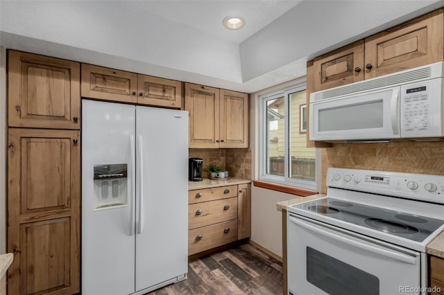 6119 Zenobia Ct, Arvada, CO 80003 - kitchen with white appliances, light countertops, backsplash, dark wood-style flooring, and recessed lighting
