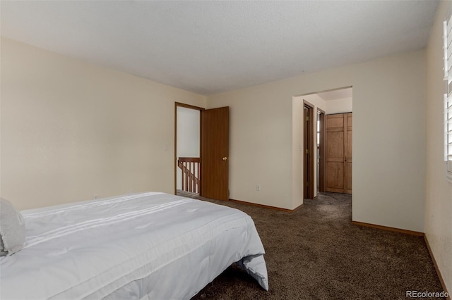 6119 Zenobia Ct, Arvada, CO 80003 - bedroom with carpet flooring and baseboards