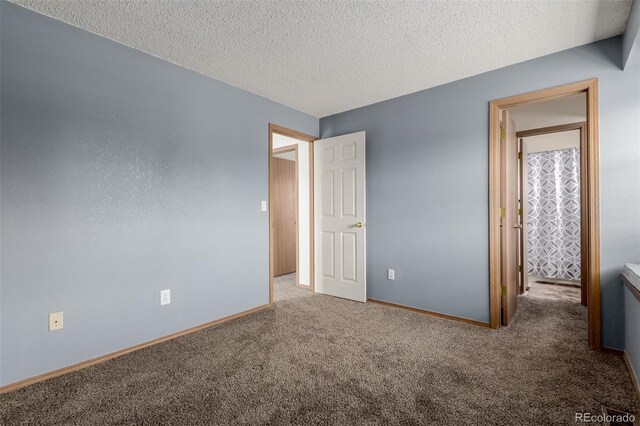 6119 Zenobia Ct, Arvada, CO 80003 - unfurnished bedroom featuring carpet flooring and a textured ceiling