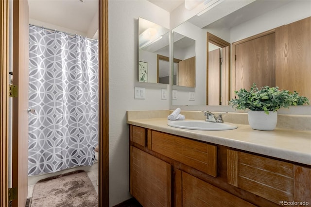 6119 Zenobia Ct, Arvada, CO 80003 - bathroom with vanity and a shower with curtain