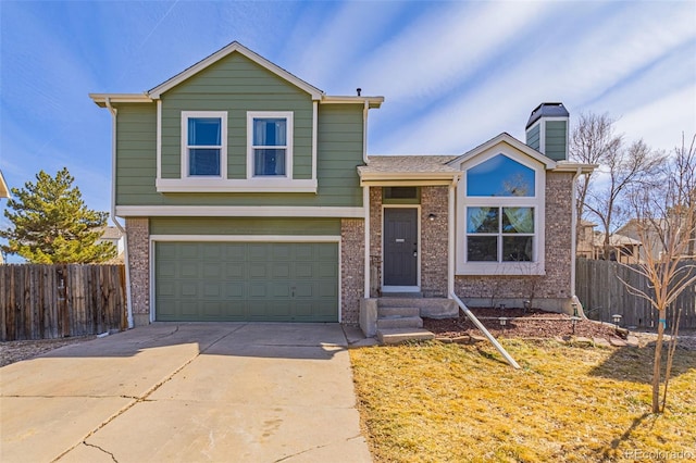 tri-level home featuring brick siding, fence, concrete driveway, a chimney, and a garage