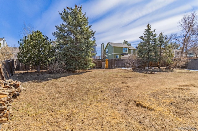 view of yard featuring a fenced backyard