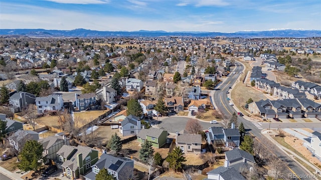 bird's eye view with a mountain view and a residential view