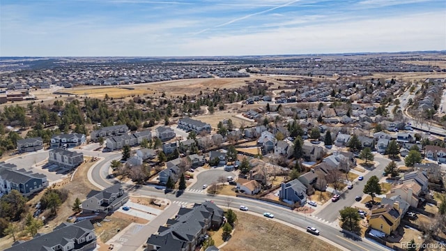 birds eye view of property with a residential view