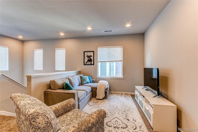 living room featuring a healthy amount of sunlight