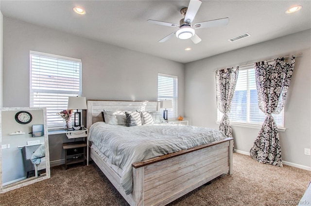 carpeted bedroom with ceiling fan