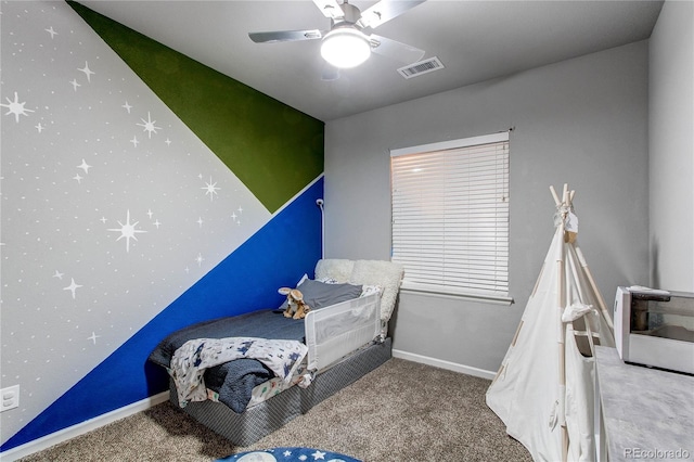 bedroom featuring ceiling fan and carpet floors