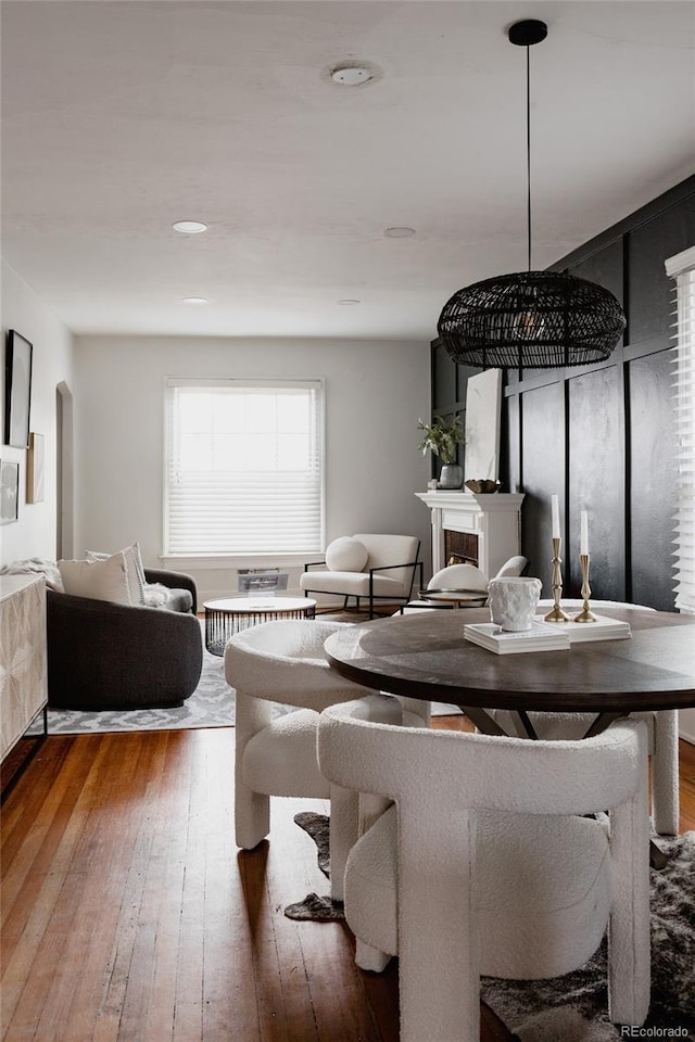 dining area with hardwood / wood-style flooring